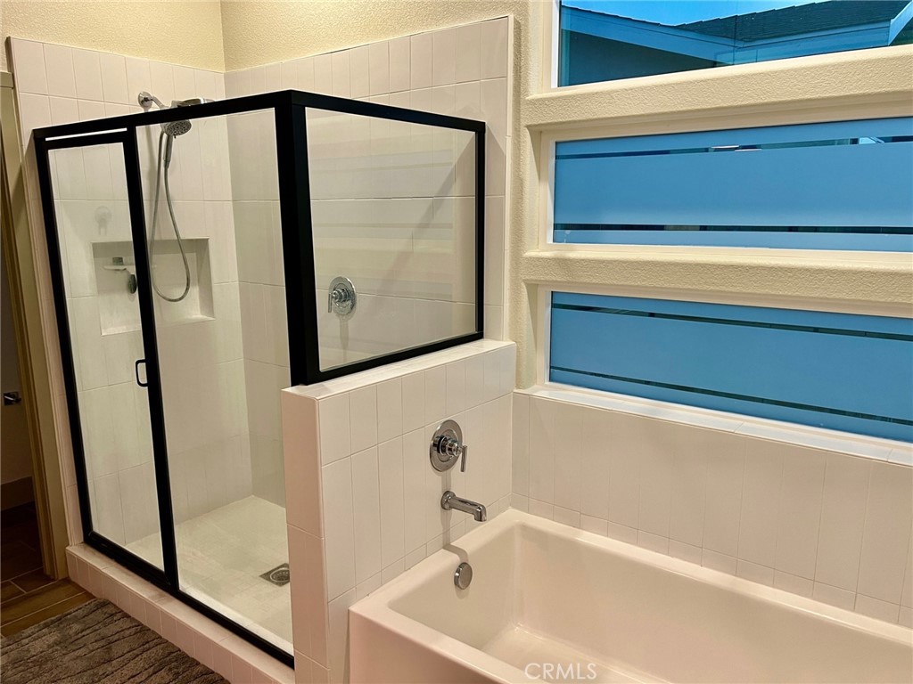 3751 Gabriel Drive Merced, CA 95340 - Photo 24 of 30 a bathroom with a bathtub and a shower