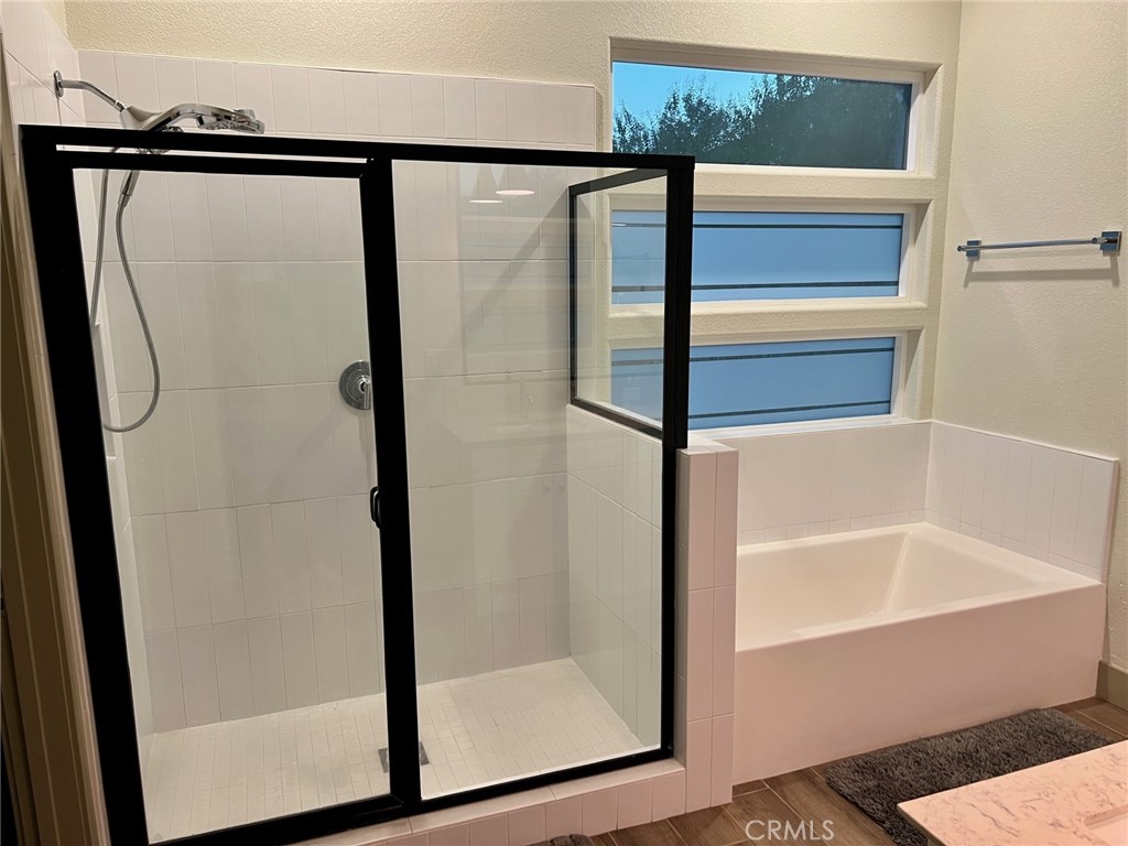 3751 Gabriel Drive Merced, CA 95340 - Photo 26 of 30 a bathroom with a bathtub and a shower