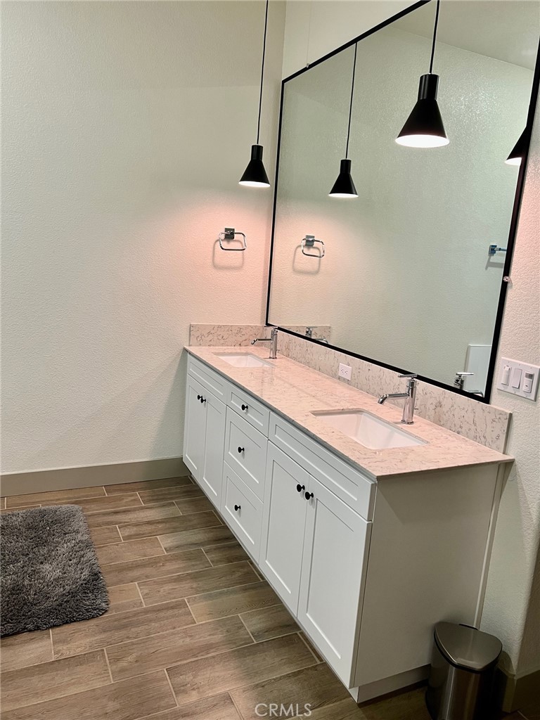 3751 Gabriel Drive Merced, CA 95340 - Photo 27 of 30 a bathroom with a sink and mirror