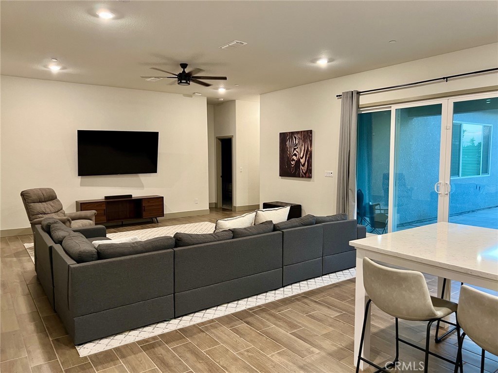 3751 Gabriel Drive Merced, CA 95340 - Photo 8 of 30 a living room with furniture and a flat screen tv