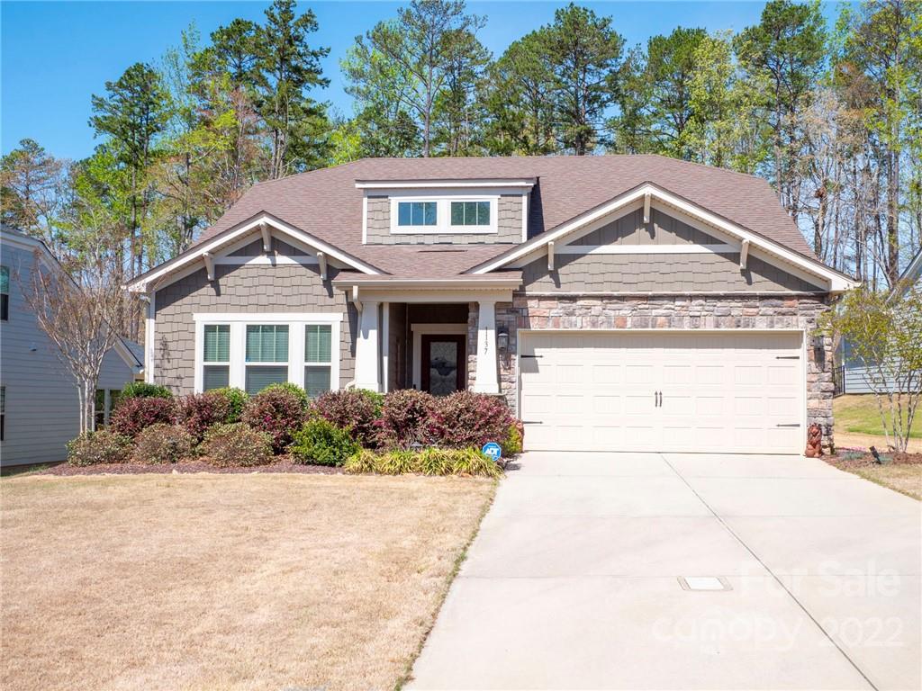 1137 Ellington Downs Way Monroe, NC 28110 - Photo 1 of 23 front view of a house with a yard