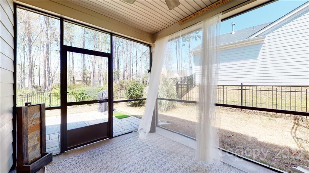 1137 Ellington Downs Way Monroe, NC 28110 - Photo 20 of 23 a view of a room with large windows