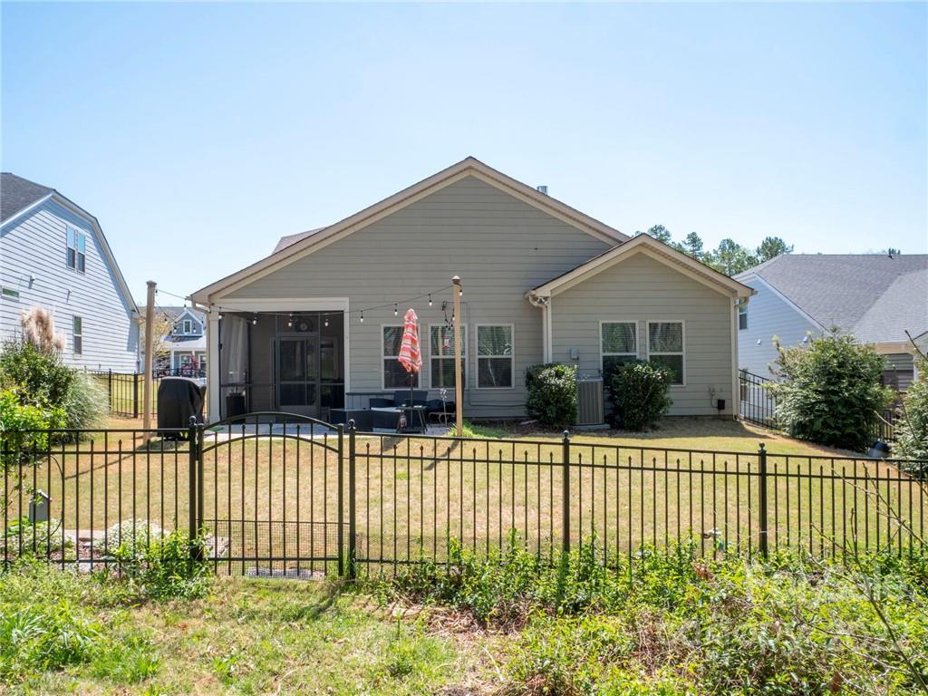 1137 Ellington Downs Way Monroe, NC 28110 - Photo 21 of 23 a house that has a lot of plants in it