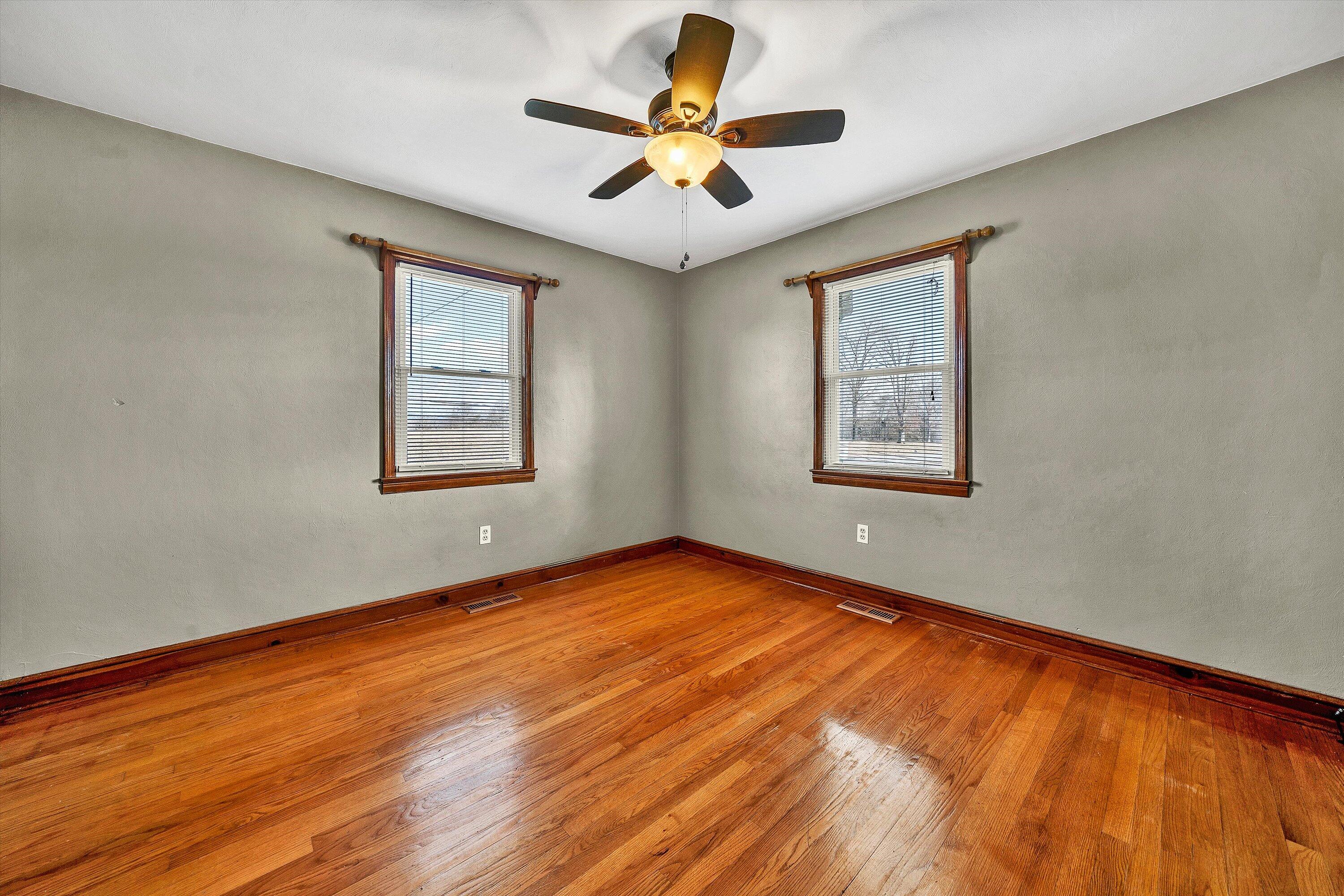 2483 Callaway Road Rocky Mount, VA 24151 - Photo 24 of 44 a view of an empty room with a window and a ceiling fan