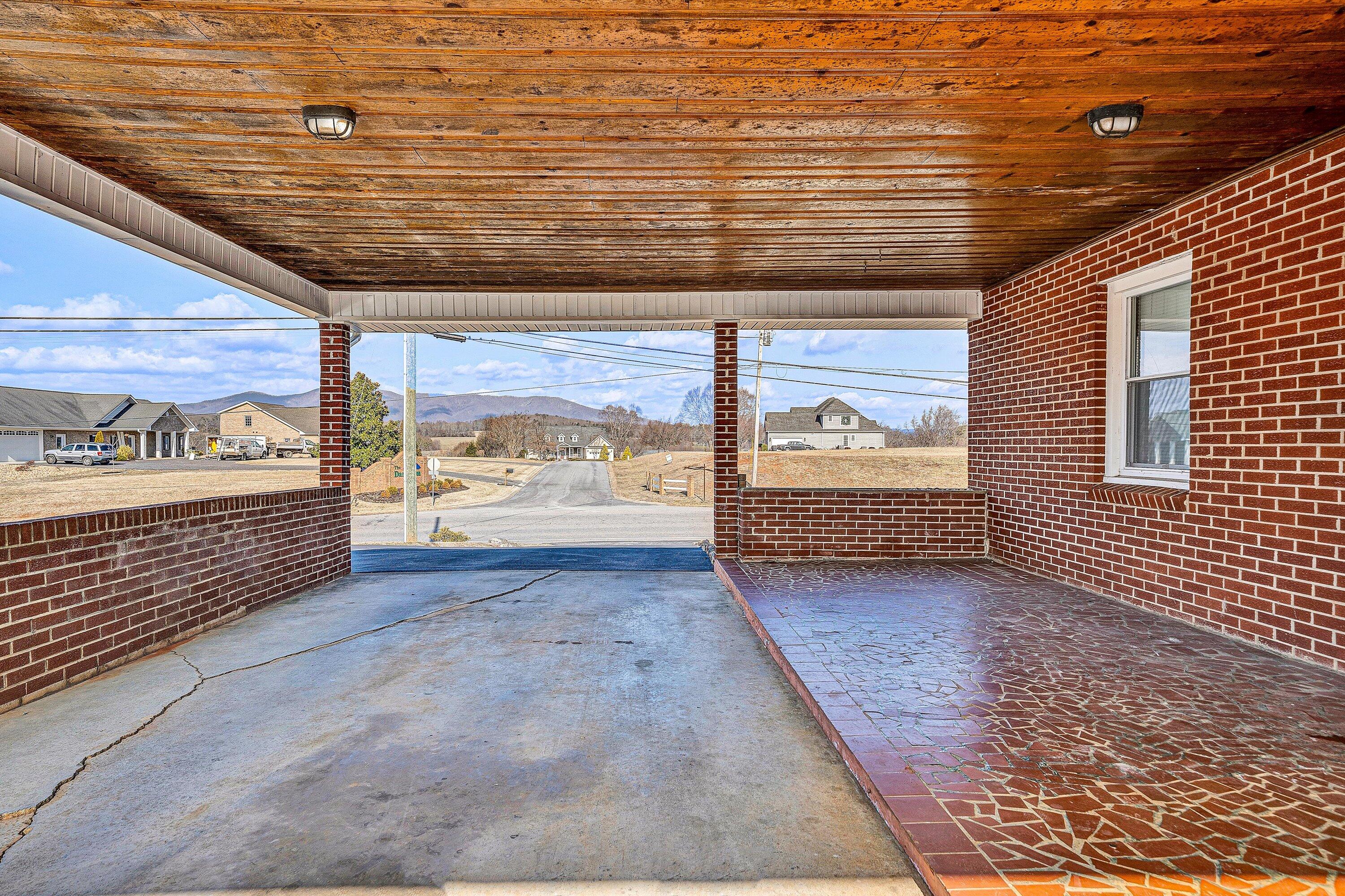 2483 Callaway Road Rocky Mount, VA 24151 - Photo 34 of 44 a view of a pathway door with wooden floor