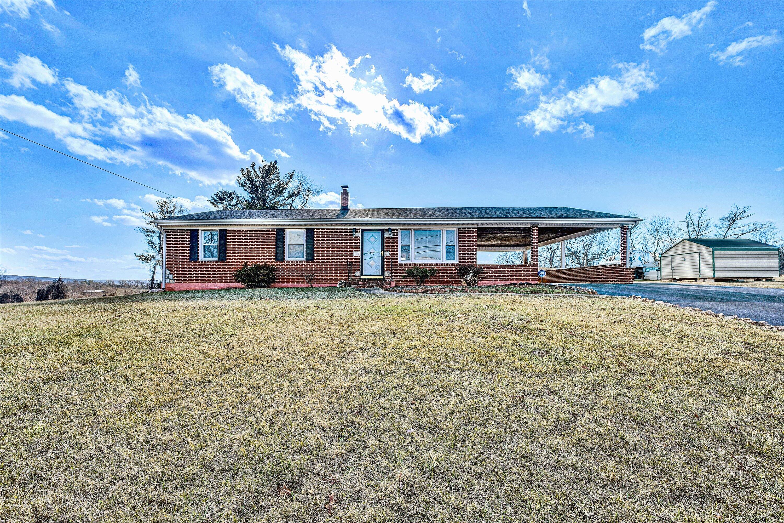 2483 Callaway Road Rocky Mount, VA 24151 - Photo 42 of 44 a house view with a garden space