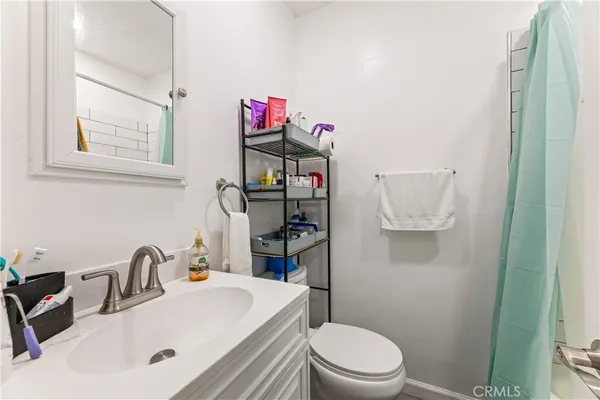 a backyard of a house with barbeque oven