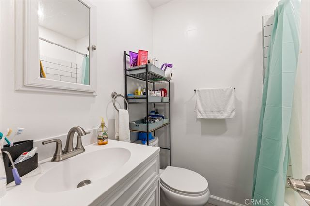 a backyard of a house with barbeque oven