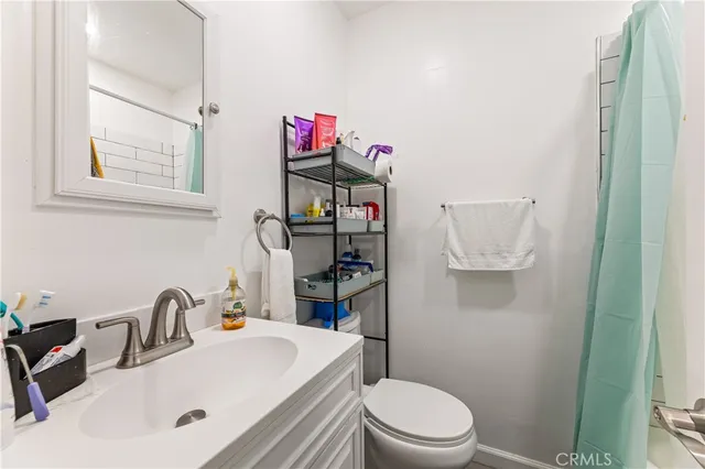 a backyard of a house with barbeque oven