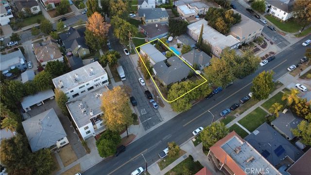 an aerial view of a house with outdoor space