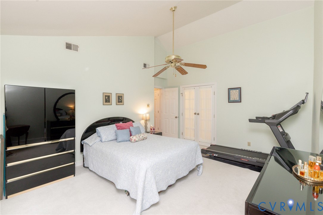 5724 Grove Forest Road Midlothian, VA 23112 - Photo 36 of 47 Room featuring vaulted ceilings, ceiling fan, and