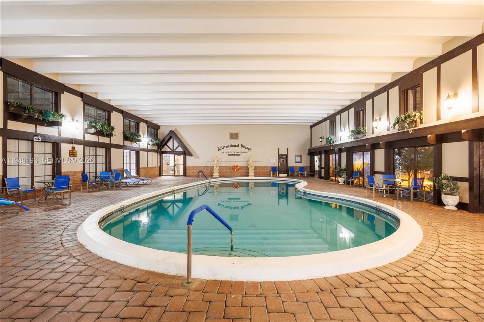 3760 Inverrary Drive, Unit 3D Lauderhill, FL 33319 - Photo 17 of 22 a view of a swimming pool with seating space