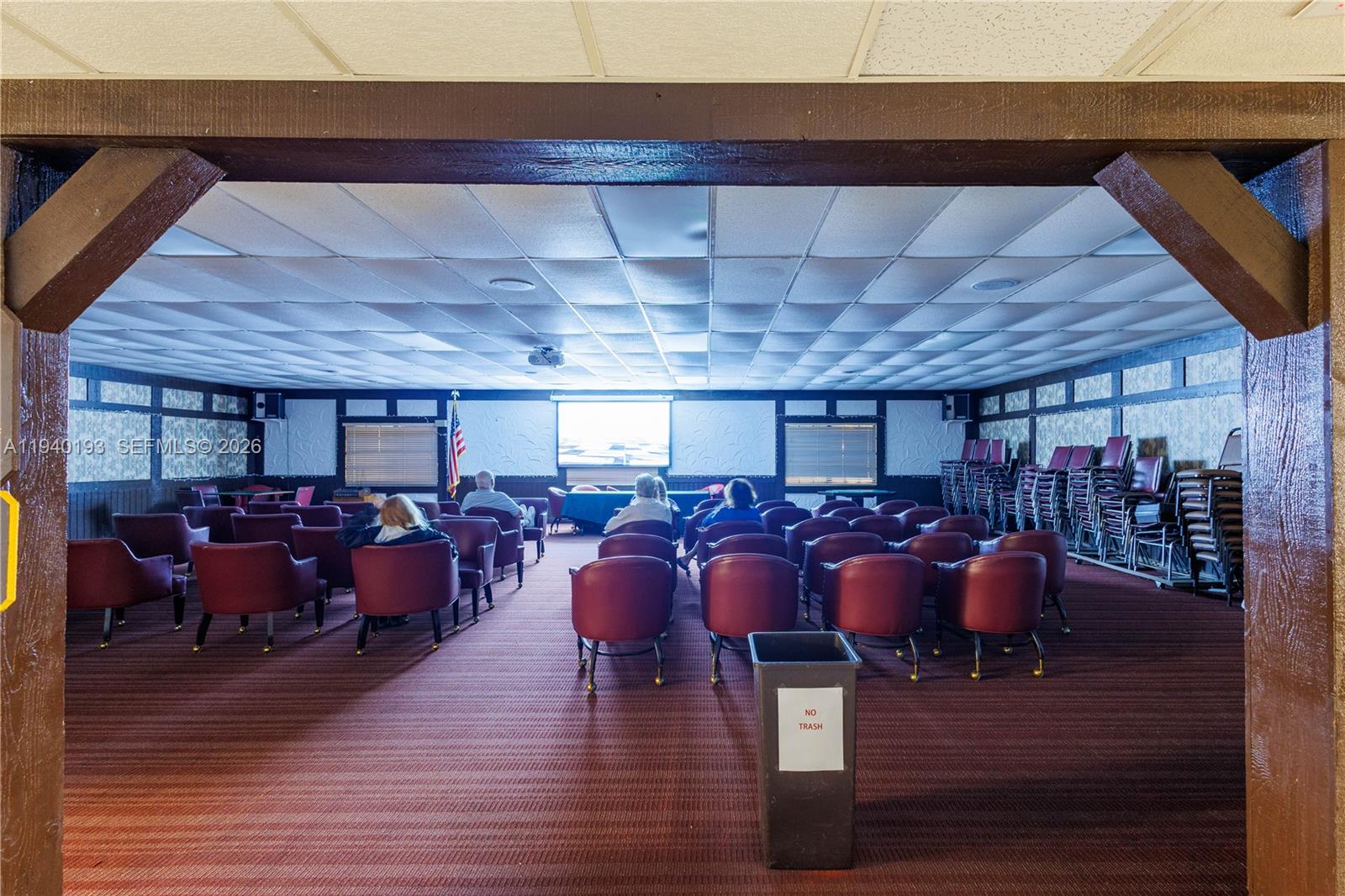 3760 Inverrary Drive, Unit 3D Lauderhill, FL 33319 - Photo 20 of 22 a view of a livingroom with furniture window and wooden floor