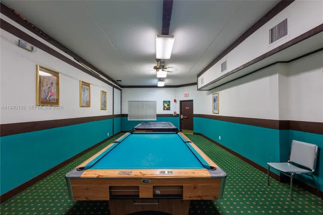 a living room with lots of furniture and a flat screen tv