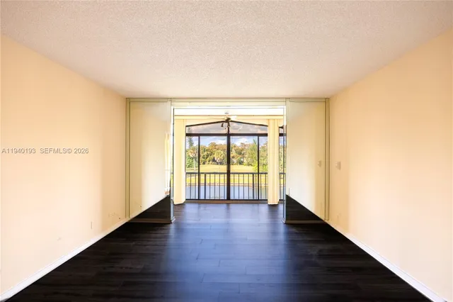 a view of room with hardwood floor