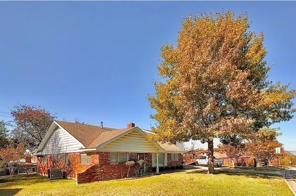a view of a house with swimming pool