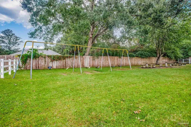 a view of a park with a slide