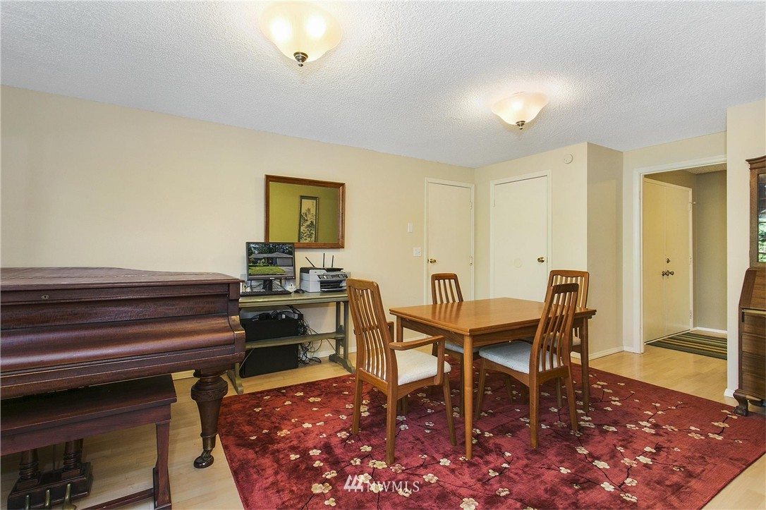 17322 24th Avenue Southeast Bothell, WA 98012 - Photo 13 of 24 a dining room with furniture and wooden floor