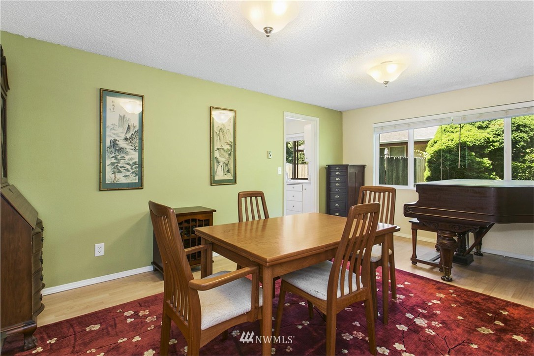 17322 24th Avenue Southeast Bothell, WA 98012 - Photo 14 of 24 a view of a dining room with furniture window and outside view