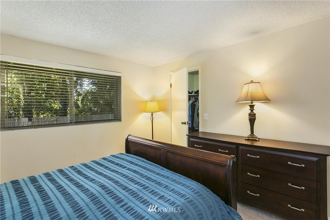 17322 24th Avenue Southeast Bothell, WA 98012 - Photo 17 of 24 a bedroom with a bed and a window