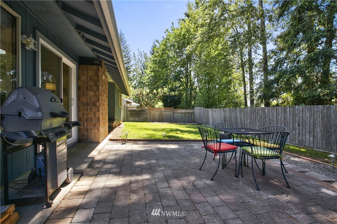 17322 24th Avenue Southeast Bothell, WA 98012 - Photo 22 of 24 a view of backyard with swimming pool and furniture