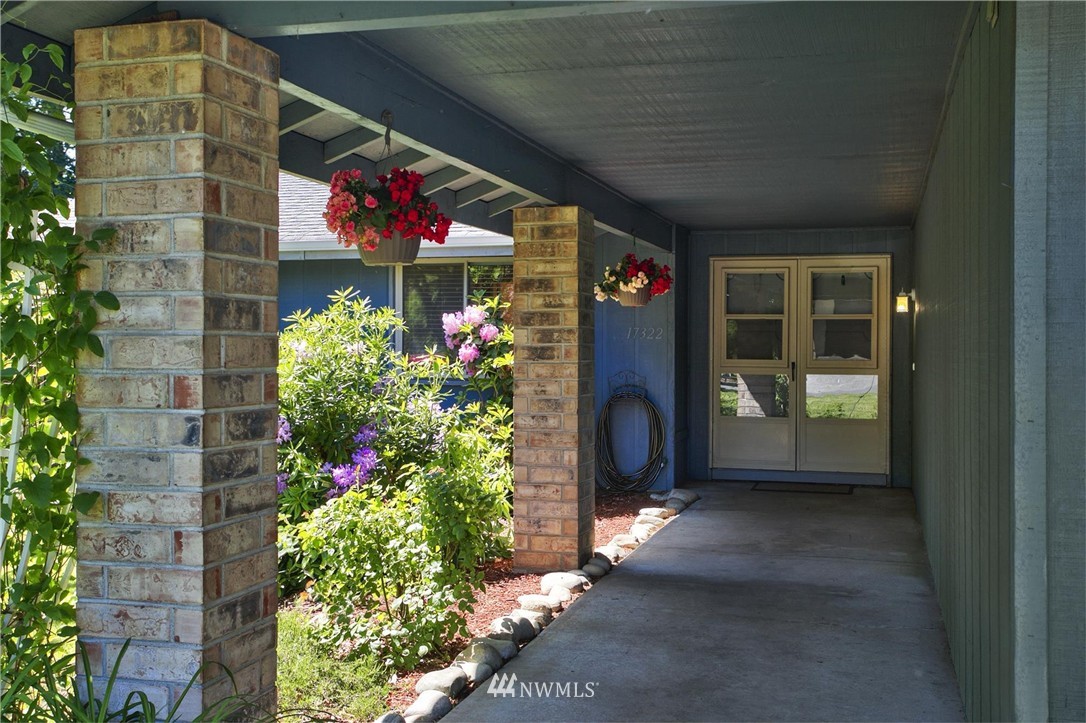 17322 24th Avenue Southeast Bothell, WA 98012 - Photo 5 of 24 a front view of a house with a porch