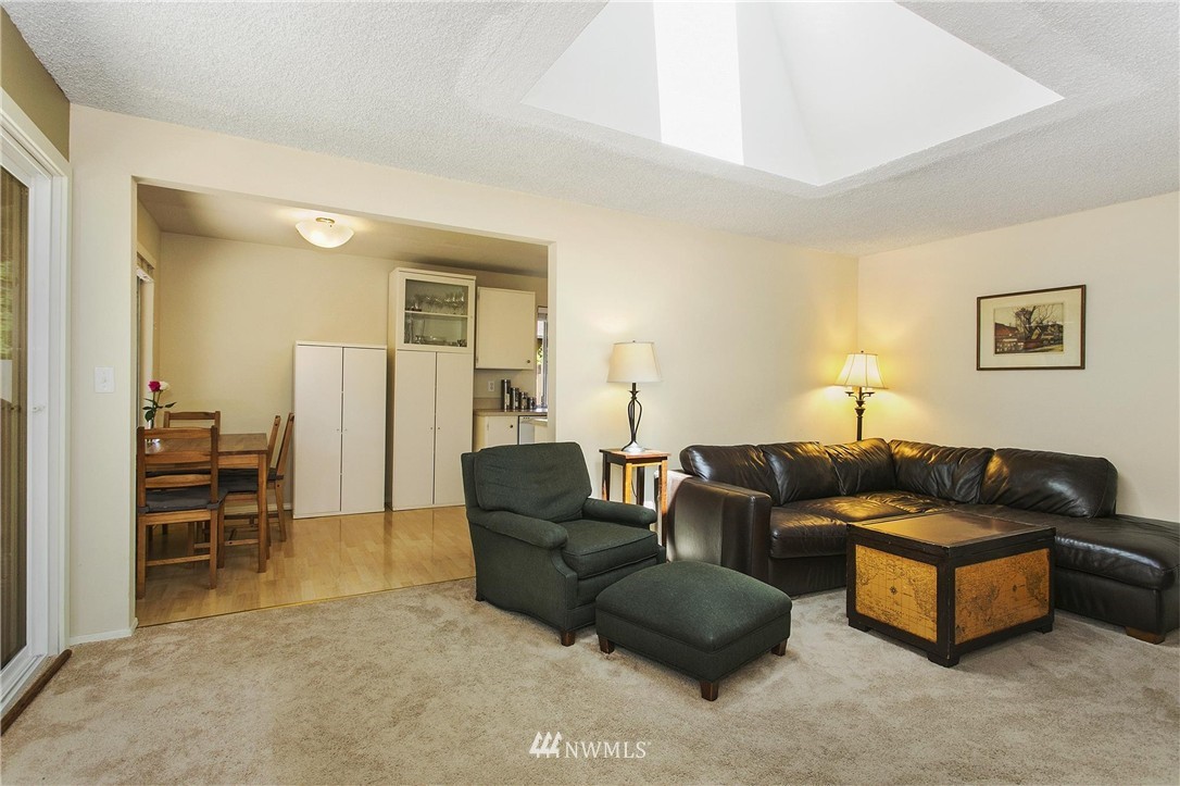 17322 24th Avenue Southeast Bothell, WA 98012 - Photo 10 of 24 a living room with furniture and a wooden floor