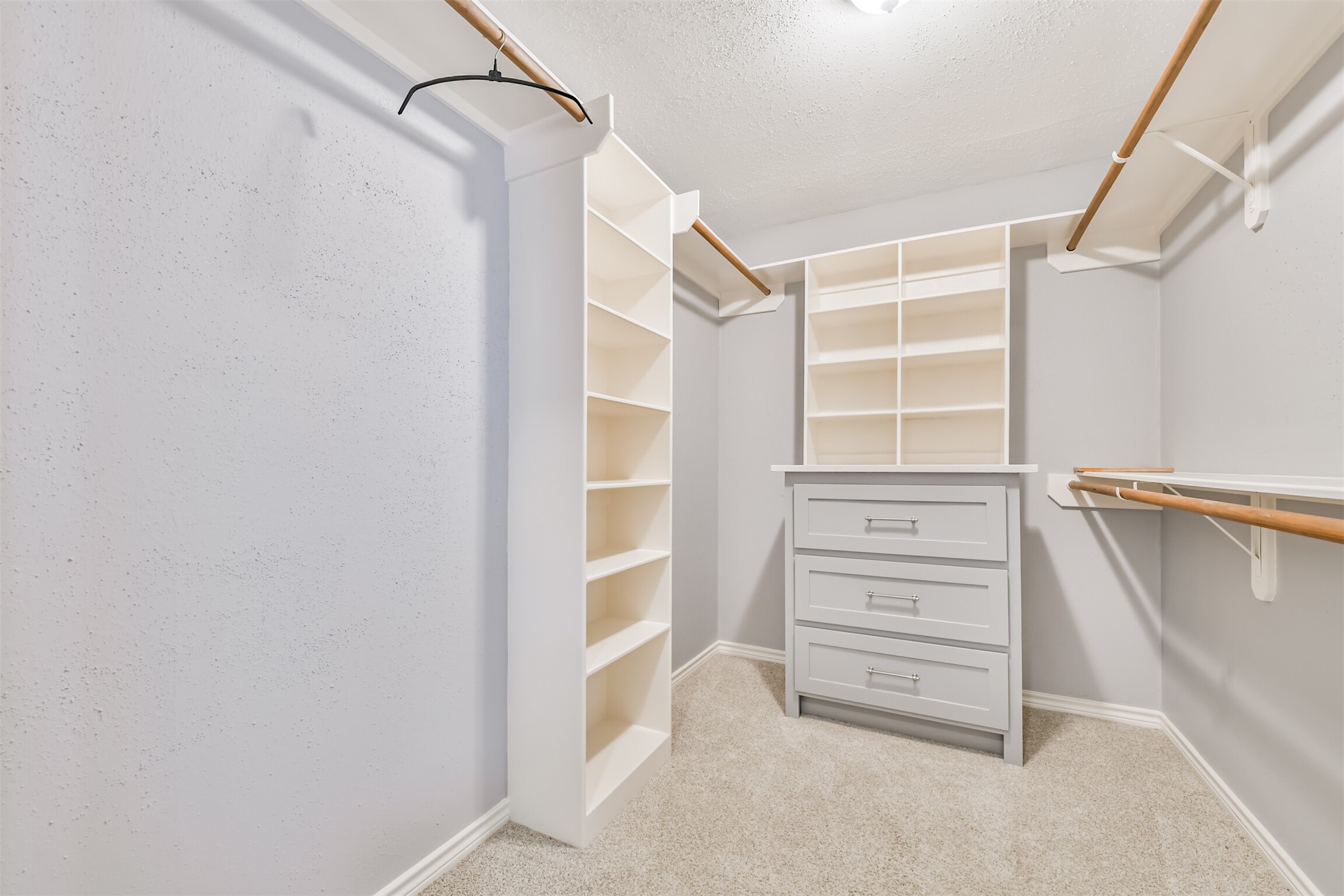 2511 Watts Street Houston, TX 77030 - Photo 22 of 34 This is just one of the primary bedroom closets ready for your wardrobe.