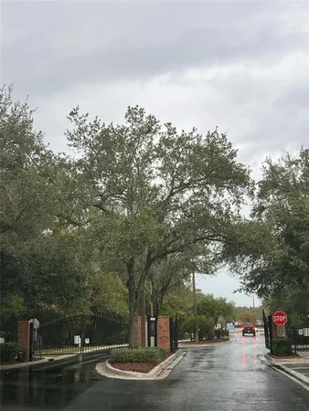 a view of a swimming pool with a backyard