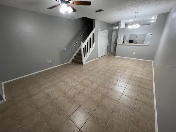 a kitchen with a refrigerator sink and stove