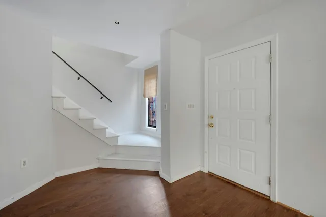 a view of entryway with stairs