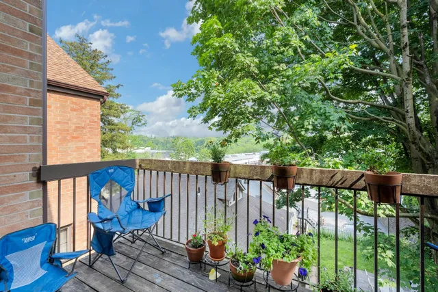 a view of a porch with a furniture