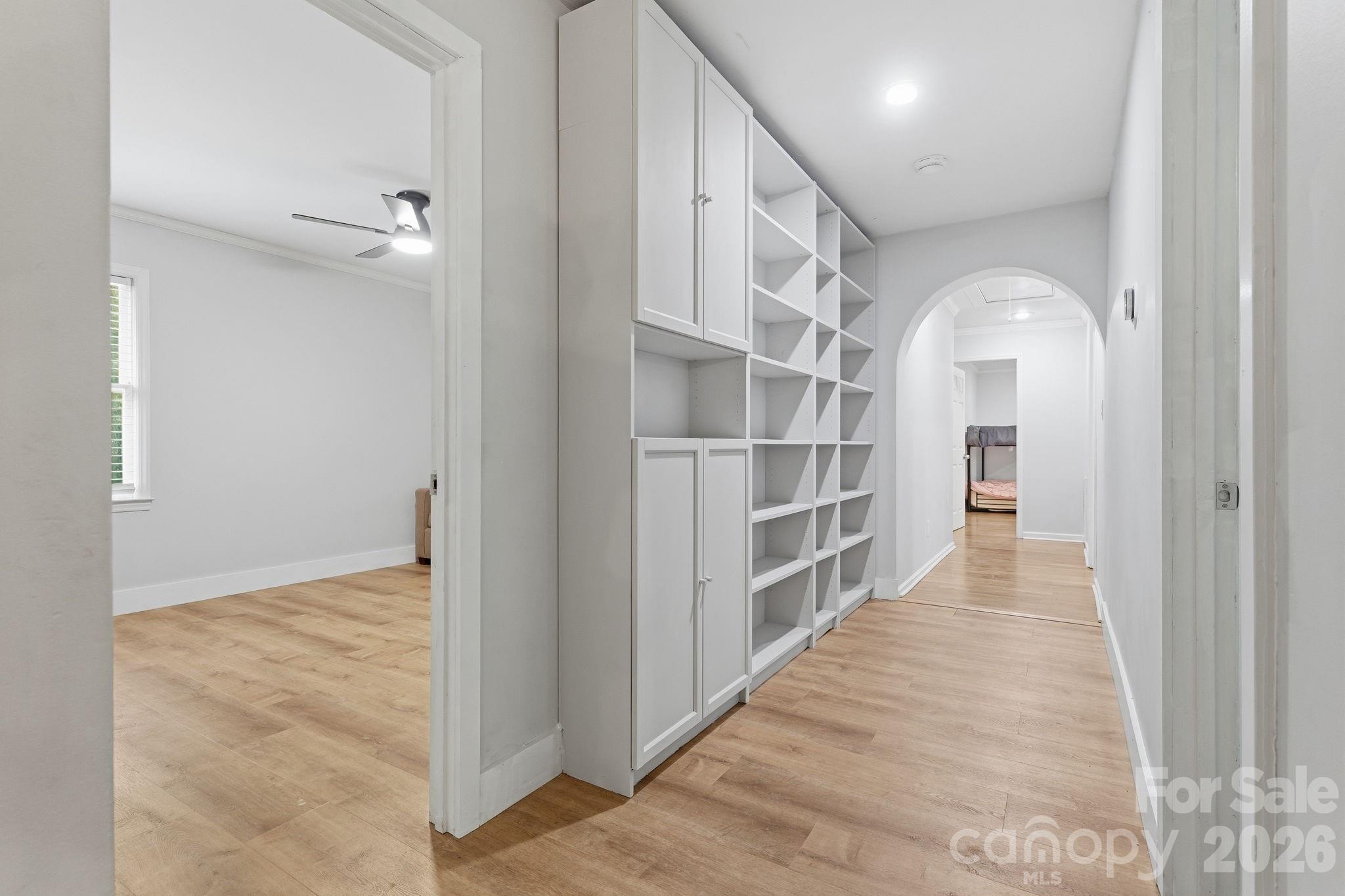 5347 Haney Road York, SC 29745 - Photo 12 of 39 a view of a hallway with wooden floor and staircase