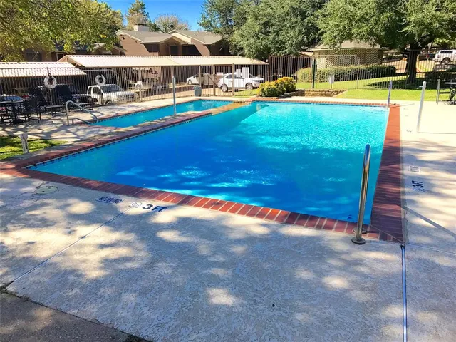 a view of a potted plant in front of a window