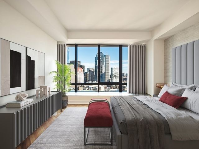 an empty room with large window