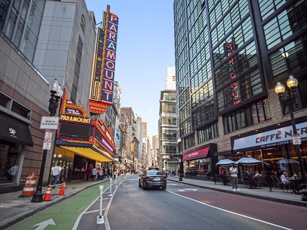 2 Avery Street, Unit 22G Boston, MA 02111 - Photo 28 of 28 a car parked in front of a building