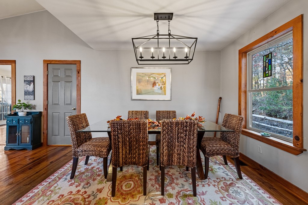 90 Hay Lane Morganton, GA 30560 - Photo 14 of 77 a view of a dining room with furniture window and wooden floor