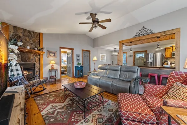 a living room with furniture and a rug