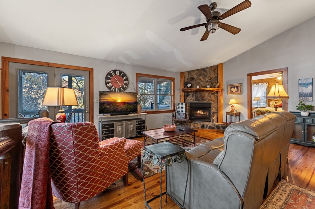 90 Hay Lane Morganton, GA 30560 - Photo 27 of 77 a living room with furniture and a flat screen tv