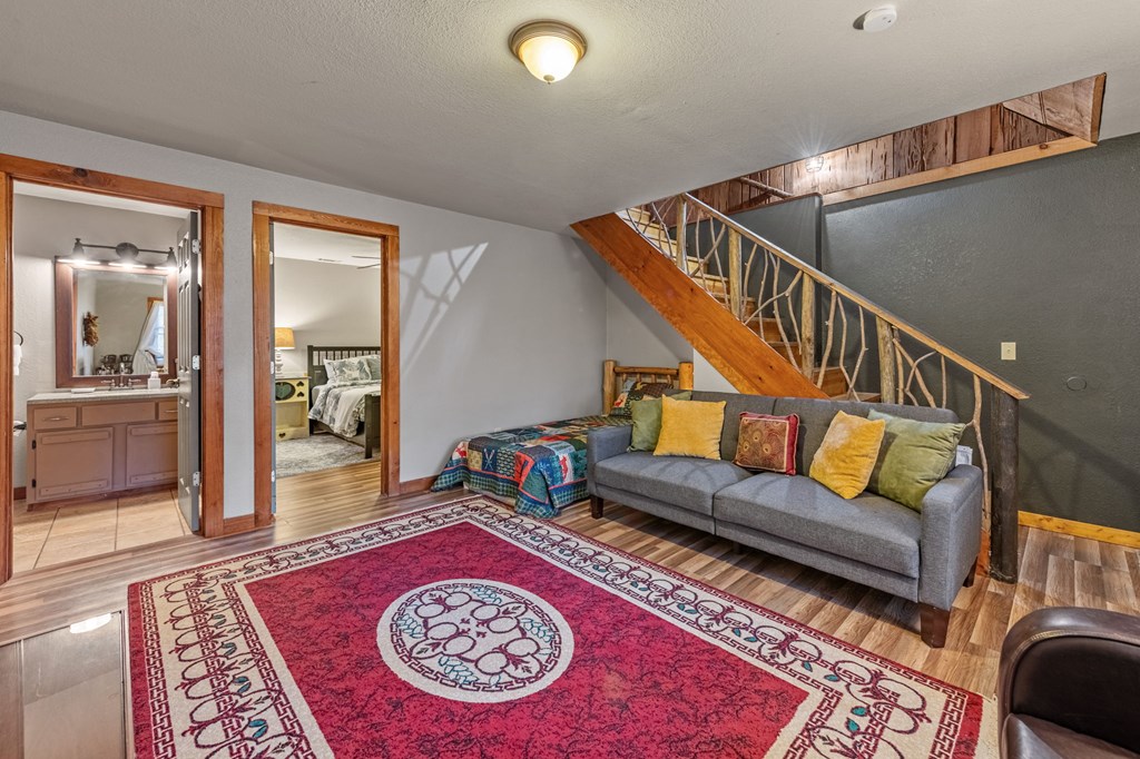 90 Hay Lane Morganton, GA 30560 - Photo 33 of 77 a living room with furniture and a rug