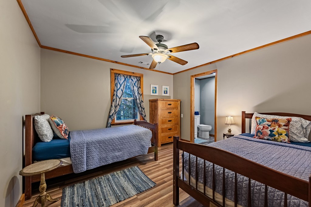 90 Hay Lane Morganton, GA 30560 - Photo 40 of 77 a bedroom with furniture and wooden floor