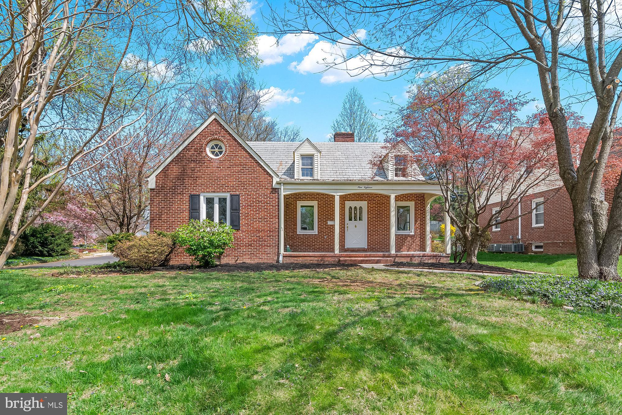 918 Weatherbee Road Baltimore, MD 21286 - Photo 3 of 59 a front view of a house with a yard