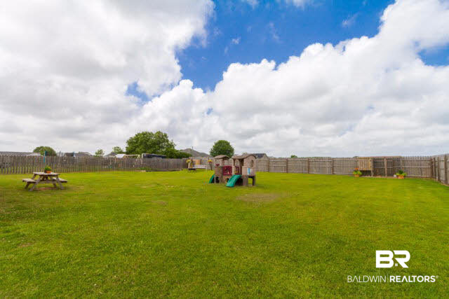 25849 Rambo Lane Elberta, AL 36530 - Photo 3 of 22 Plenty of room for animals, a garden and swing set!