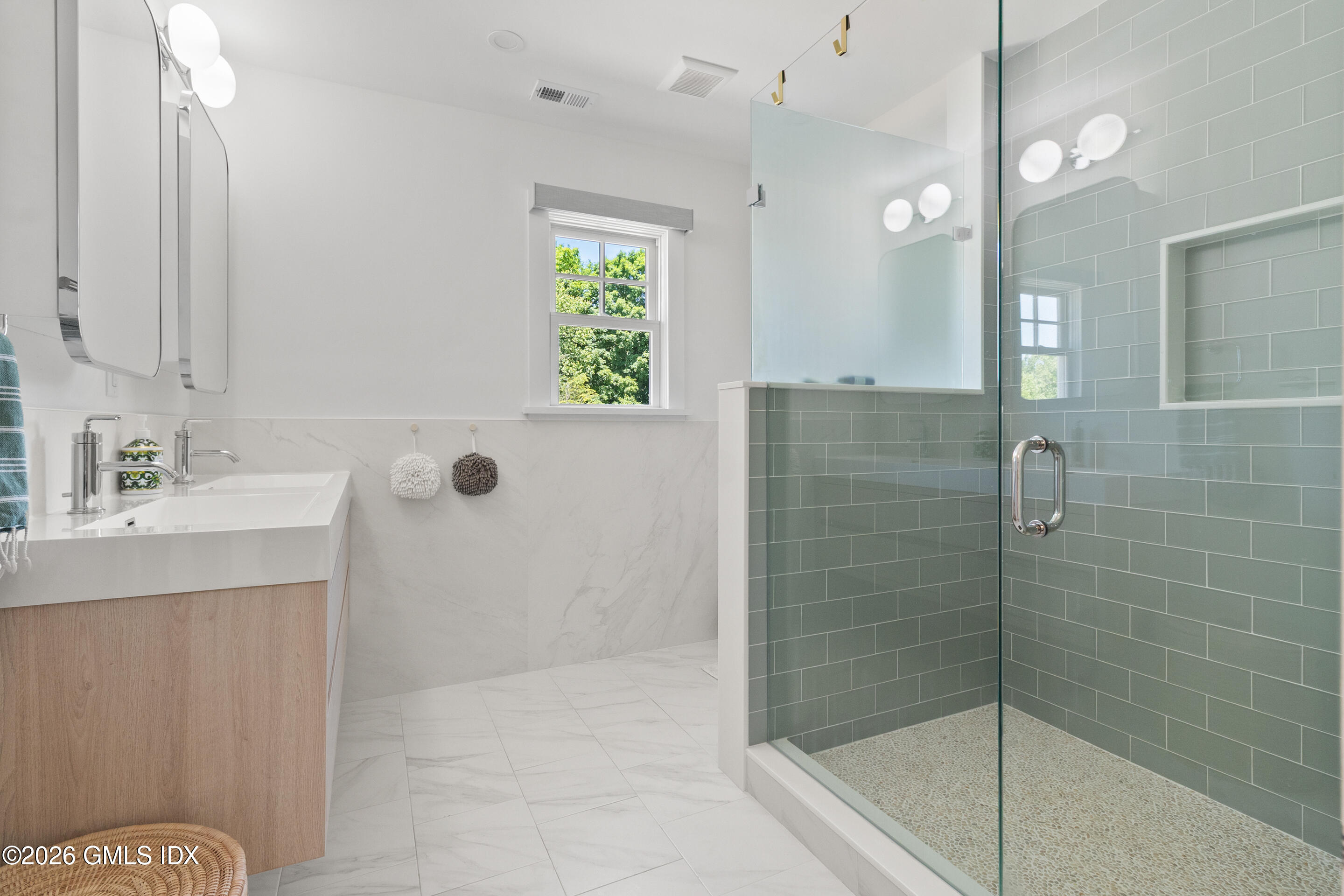9 Deluca Drive Cos Cob, CT 06807 - Photo 14 of 30 a bathroom with a shower and a sink