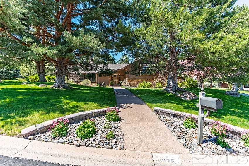 4075 Ramrod Circle Reno, NV 89519 - Photo 1 of 24 a view of a park with large trees