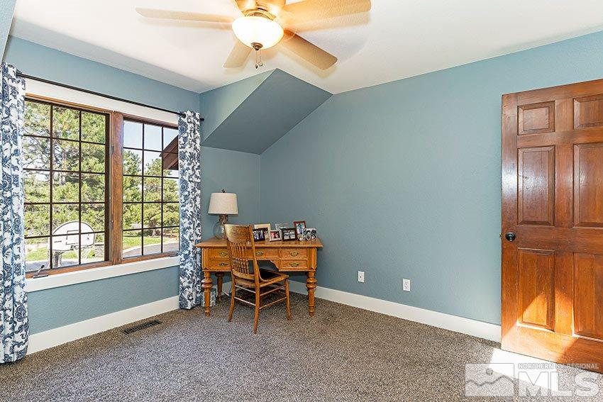 4075 Ramrod Circle Reno, NV 89519 - Photo 14 of 24 a living room with furniture and a window