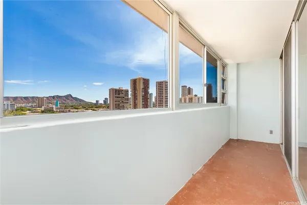 a view of a balcony with city view