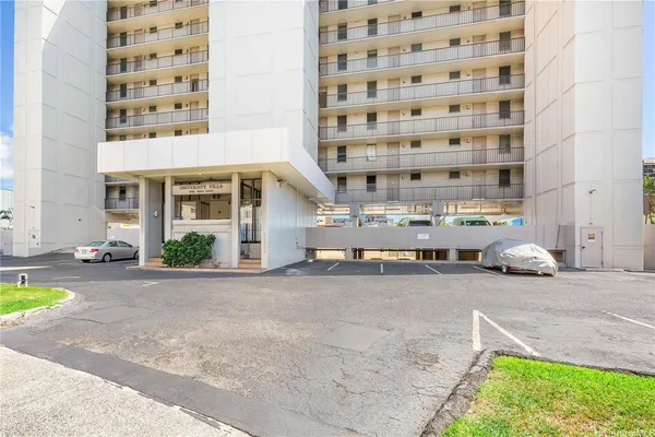 a view of a building with a road