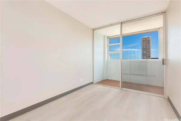 an empty room with closet