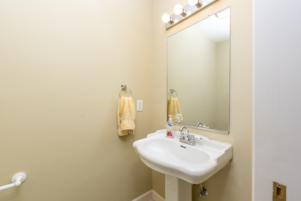 2161 Middlebrook Road Staunton, VA 24401 - Photo 18 of 75 a bathroom with a sink a mirror and a toilet